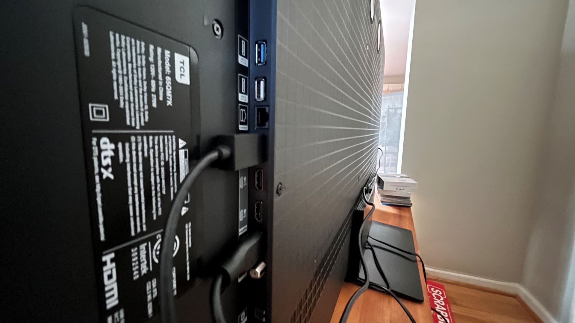 TCL QM7K rear panel ports