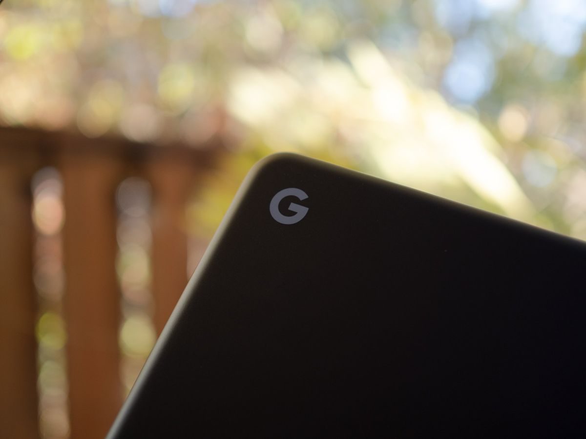 An image of a black Pixelbook Go with its &quot;G&quot; Logi displayed on the lid.