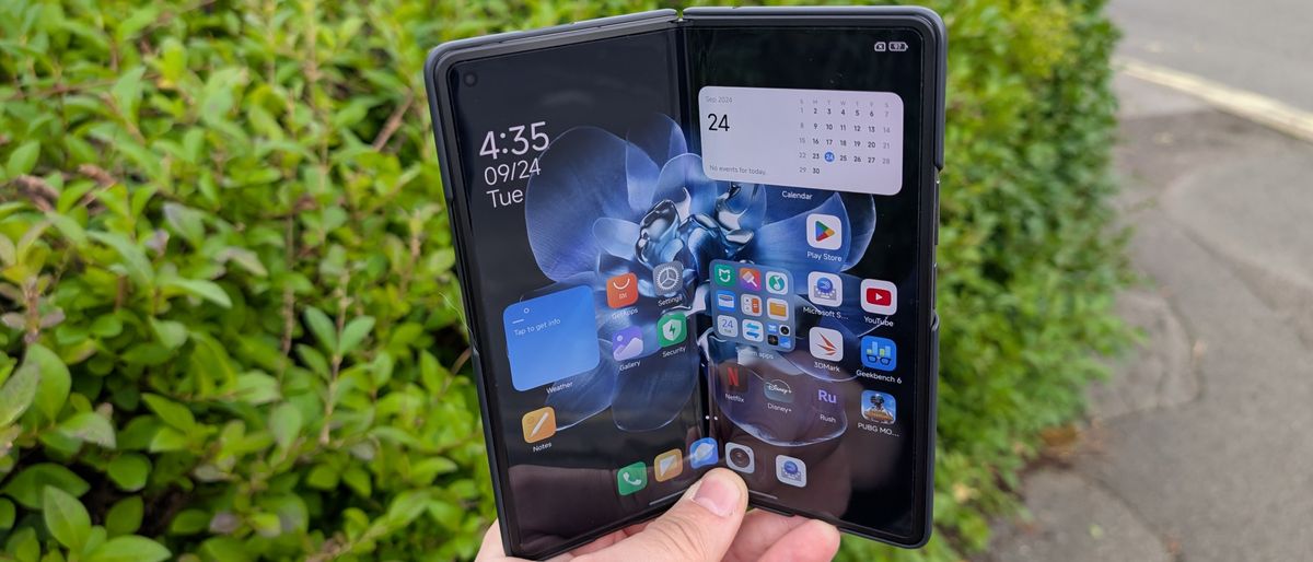 xiaomi mix fold 4 review images showing off the phone from multiple angles