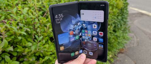 xiaomi mix fold 4 review images showing off the phone from multiple angles