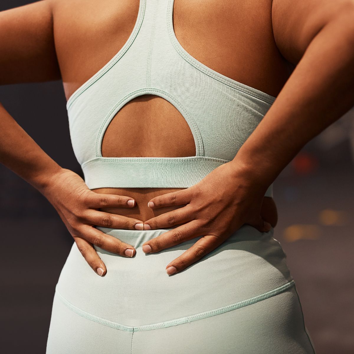 Norwegian 4x4 workout: A woman rests in gym kit after a workout 