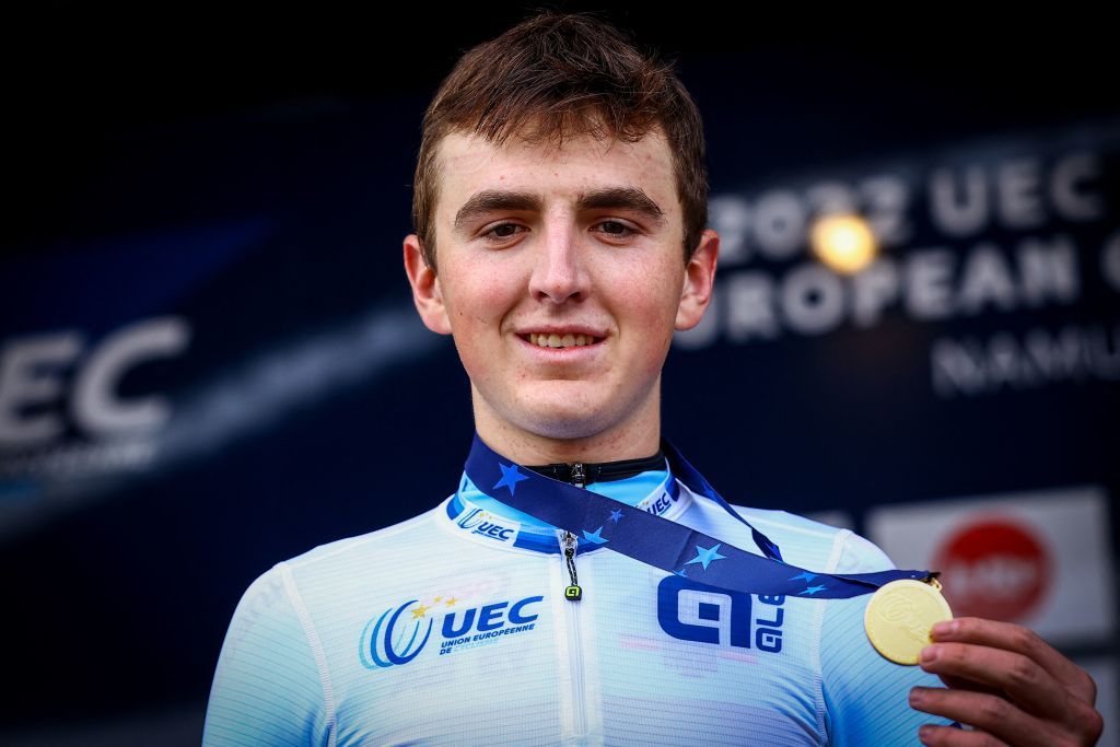 Belgian Emiel Verstrynge winner of the gold medal celebrates on the podium of the U23 mens race at the European Championships cyclocross cycling Saturday 05 November 2022 in Namur Belgium BELGA PHOTO DAVID PINTENS Photo by DAVID PINTENS BELGA MAG Belga via AFP Photo by DAVID PINTENSBELGA MAGAFP via Getty Images