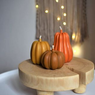 Set of pumpkin shaped candles