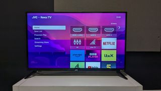 JVC LT-32CR230 with Roku TV home menu on screen