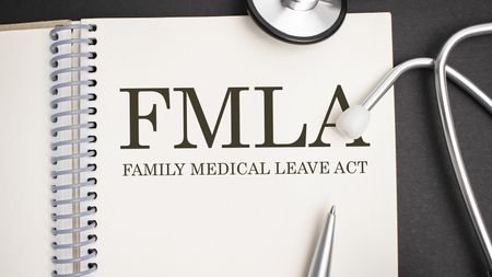 A sign showing the Family and Medical Leave Act.