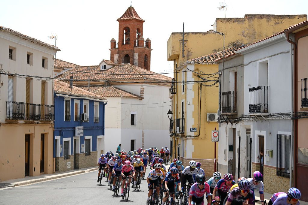 LA RODA SPAIN MAY 03 A general view of the peloton passing through Pozohondo Village during the 9th La Vuelta Femenina 2023 Stage 3 a 1578km stage from Elche de la Sierra to La Roda UCIWWT on May 03 2023 in La Roda Spain Photo by Dario BelingheriGetty Images