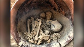 The Bronze Age woman and man were interred in a large ceramic pot in a in the governing hall of a palatial building