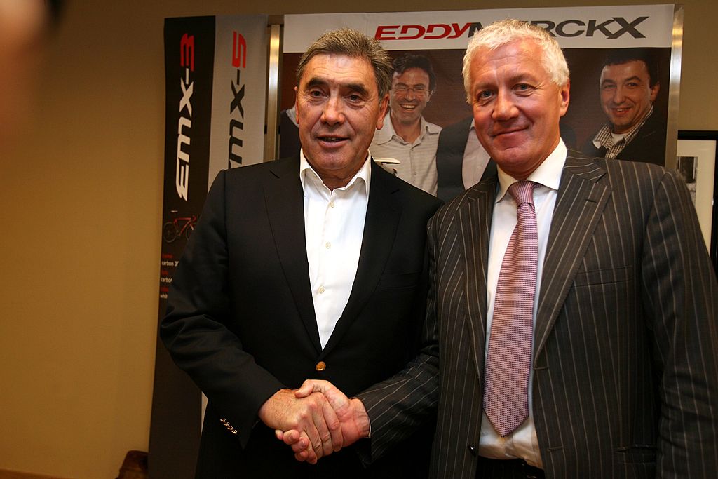 Eddy Merckx L and Quick Step manager Patrick Lefevere R pose after Quickstep cycling team announced Merckx Cycles as the teams new technical partner on November 20 2009 in Brussels AFP PHOTO PHOTO VIRGINIE LEFOUR Photo credit should read VIRGINIE LEFOURAFP via Getty Images