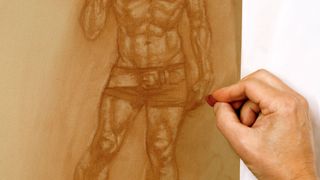 How to draw a figure: Artist using an eraser to build up form