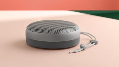 Best Bluetooth speakers, B&O A1 on pink surface