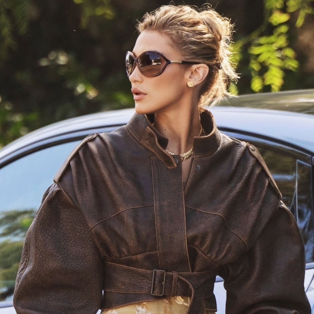 Bella Hadid was spotted in L.A. wearing an embroidered butter yellow skirt and an oversize leather bomber jacket