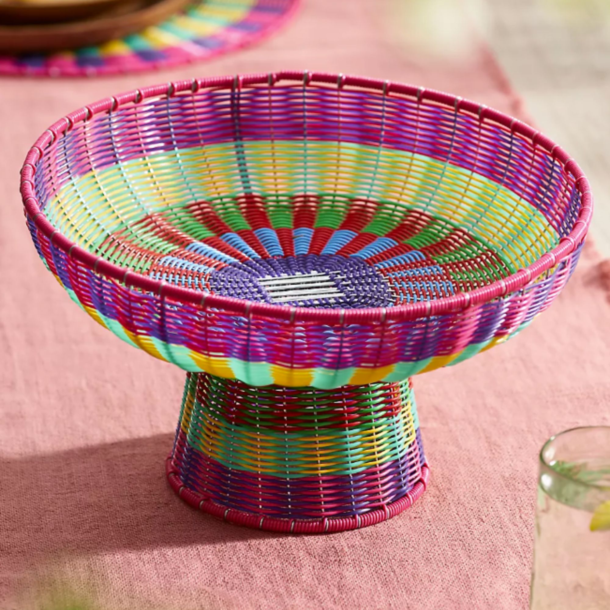 Brightly colored woven fruit bowl