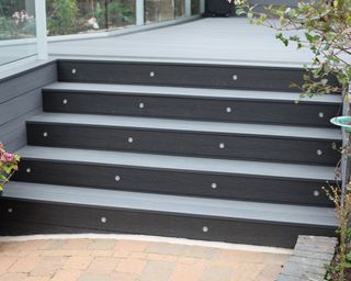 contemporary deck steps design with lighting