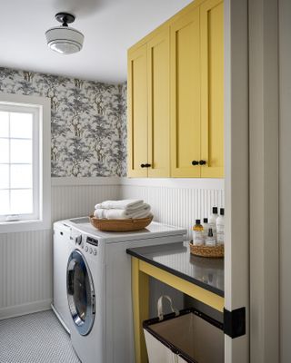 Ikea laundry room hack yellow cabinets by Semihandmade