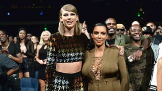 Taylor Swift and Kim Kardashian backstage at the 2015 MTV Video Music Awards