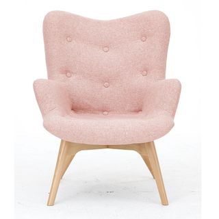 armchair with blush pink and white background