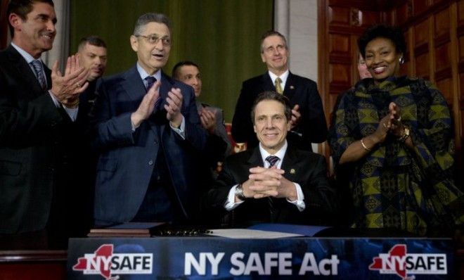 New York Gov. Andrew Cuomo and legislative leaders applaud after Cuomo signed New York&amp;#039;s Secure Ammunition and Firearms Enforcement Act into law on Jan. 15.