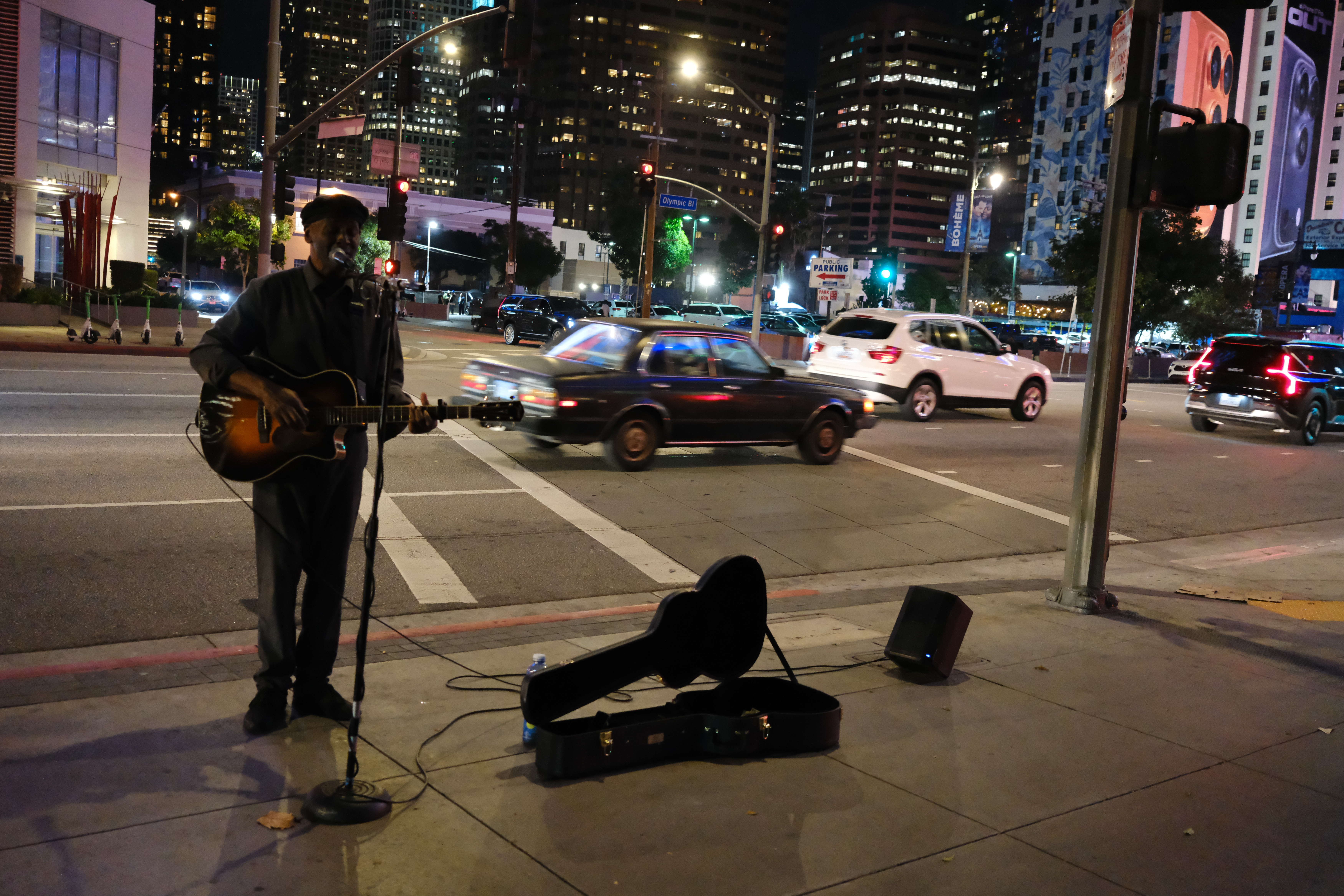 A musician plays guitar on the streets of downtown Los Angeles, taken with the FUjifilm XF 23mm f/2.8 R WR and X-E5