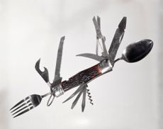 A retro multi-tool folding pocket knife including a spoon, fork, scissors, saw and more. Retro Large (Photo by H. Armstrong Roberts/Retrofile/Getty Images)