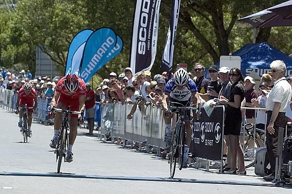Michael Matthews (right) of Jayco/Skins completes the trifecta as he pulls a mono on the line ahead of Drapac Porsche's Joseph Lewis.