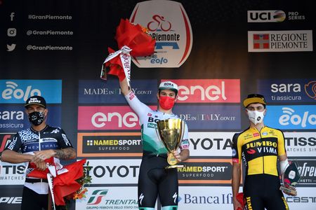 BORGOSESIA ITALY OCTOBER 07 LR Giacomo Nizzolo of Italy and Team Qhubeka Nexthash on second place race winner Matthew Walls of United Kingdom and Team Bora Hansgrohe and Olav Kooij of Netherlands and Team Jumbo Visma on third place pose on the podium during the podium ceremony after the during the 105th Gran Piemonte 2021 a 168km race from Rocca Canavese to Borgosesia 350m GranPiemonte on October 07 2021 in Borgosesia Italy Photo by Tim de WaeleGetty Images