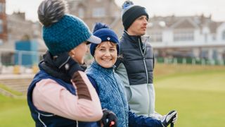 Alison Root Katie Dawkins and Joel Tadman on the 1st tee old course st andrews