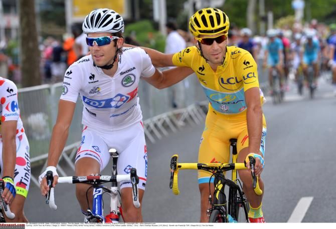 The white jersey of Thibaut Pinot (FDJ) with the yellow jersey of Vincenzo Nibali (Astana)