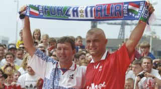 22 Jul 1996: Bryan Robson the manager of Middlesbrough with Fabrizio Ravanelli of Italy as he signs for Midllesbrough and is greeted by the home crowd at Riverside Stadium in Middlesbrough