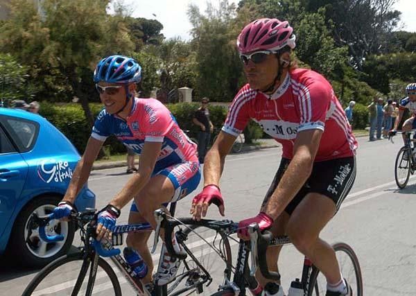 Damiano Cunego (l) and Jan Ullrich ride together during stage 12