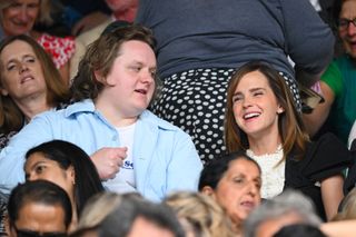 Lewis Capaldi and Emma Watson speak as they attend day thirteen of the Wimbledon Tennis Championships at All England Lawn Tennis and Croquet Club on July 15, 2023 in London, England.