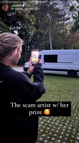 Dempsey taking a photo of a van