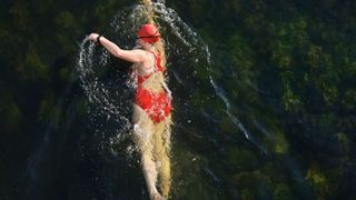 Woman wild swimming