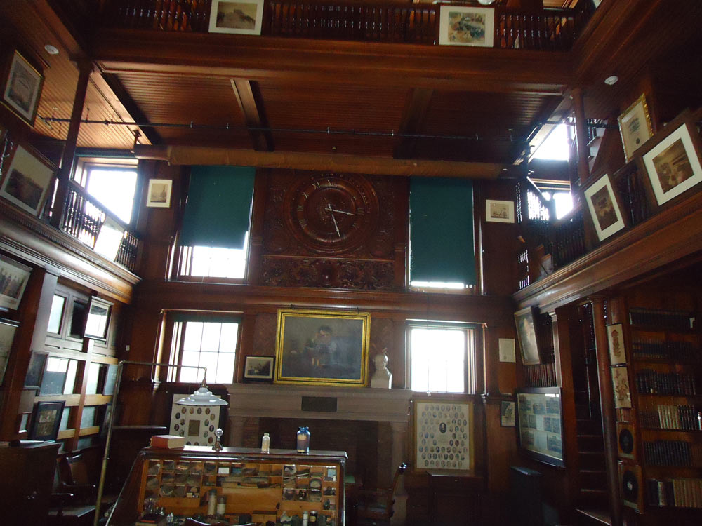 Edison's projection screen for showing films hangs (rolled up) from the second floor of the library in the West Orange laboratory.