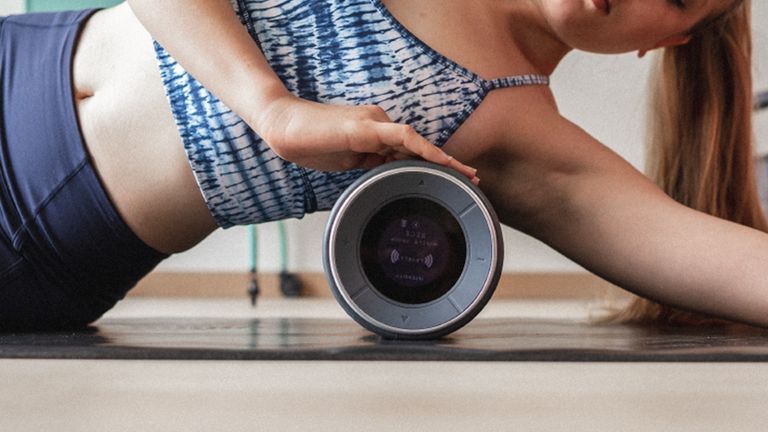 Woman using the best foam roller