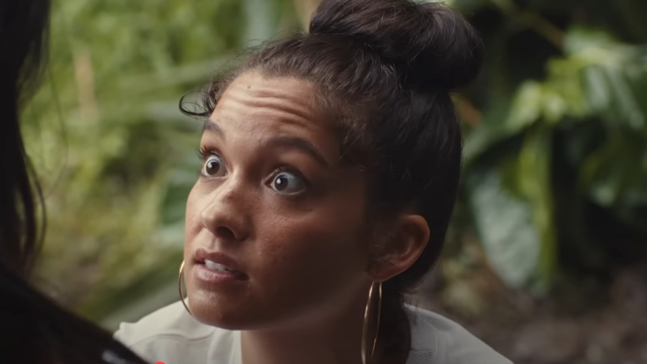 Sydney Agudong looking intensely at Lilo in live-action Lilo & Stitch