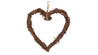 A rattan heart-shaped wreath, one of the best Christmas wreaths