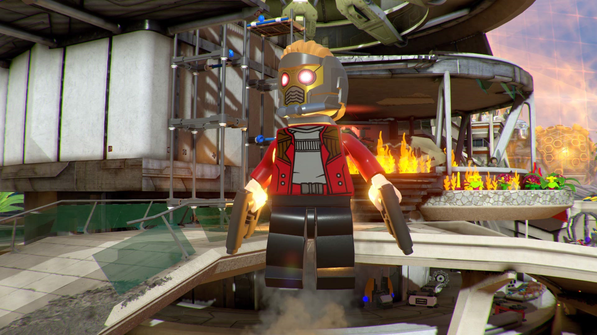 best lego games: a Lego Star-Lord flies through the roof of a burning building