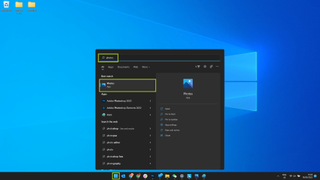 The Windows 11 Start menu with the Photos app highlighted
