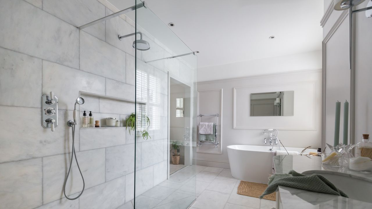 White bathroom with walk in shower 