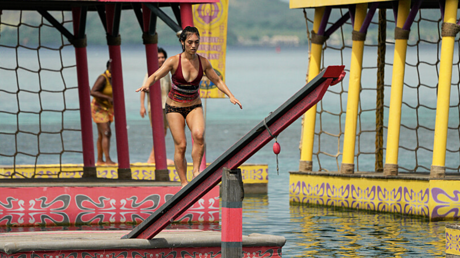 Savannah Louie navigating an obstacle course over water in Survivor 49