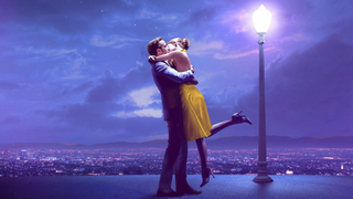 A romantic scene from La La Land featuring a couple embracing under a glowing streetlamp, with a city skyline and a dreamy, starry sky in the background.