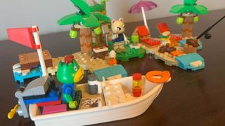 Lego Kapp'n's Island Boat Tour set on a wooden table