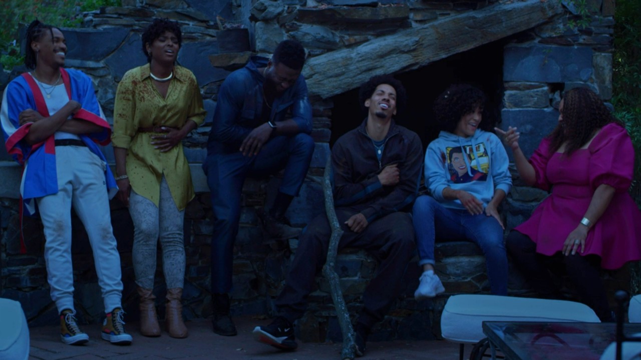 Grace Byers, Melvin Gregg, X Mayo, Dewayne Perkins, Antoinette Robertson, and Sinqua Walls talking in The Blackening.