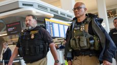 ICE agents at an airport
