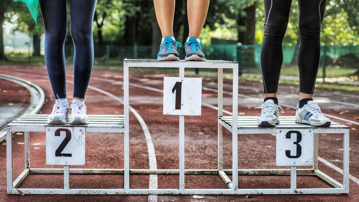 Close up of runners’ feet on a podium