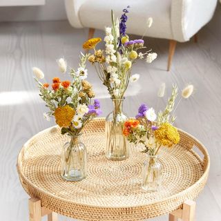 dried flower vases on table