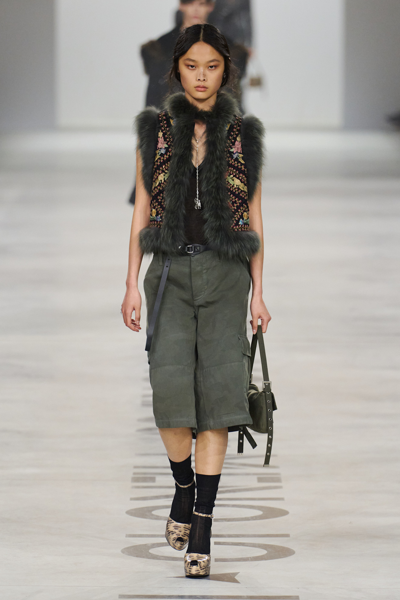 A model wore the Bermuda shorts trend on Fendi's Fall 2026 runway
