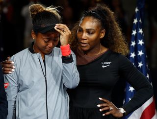 Naomi Osaka of Japan cries after winning the Women's Singles finals match alongside runner up Serena Williams of the United States on Day Thirteen of the 2018 US Open at the USTA Billie Jean King National Tennis Center on September 8, 2018 in the Flushing neighborhood of the Queens borough of New York City.