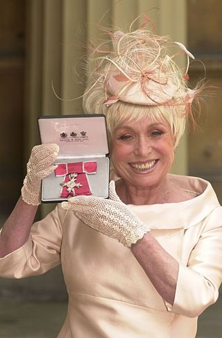Babs accepted her MBE from the Queen in 2000