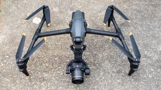 DJI Inspire 3 drone on the ground with propellers folded away